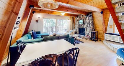 Dog-friendly 2-story home with large deck, tree views, fireplace, & W/D