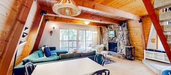 Dog-friendly 2-story home with large deck, tree views, fireplace, hammock, & W/D