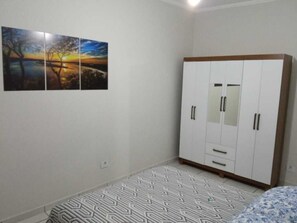 1 bedroom, iron/ironing board, free WiFi, bed sheets - Espaço Acolhedor Perto da Praia (Boa Vista São Vicente)
