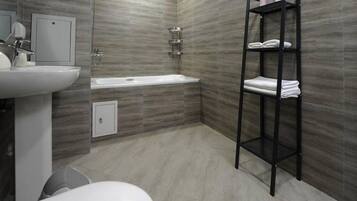 Separate bathtub and shower, rainfall showerhead, free toiletries