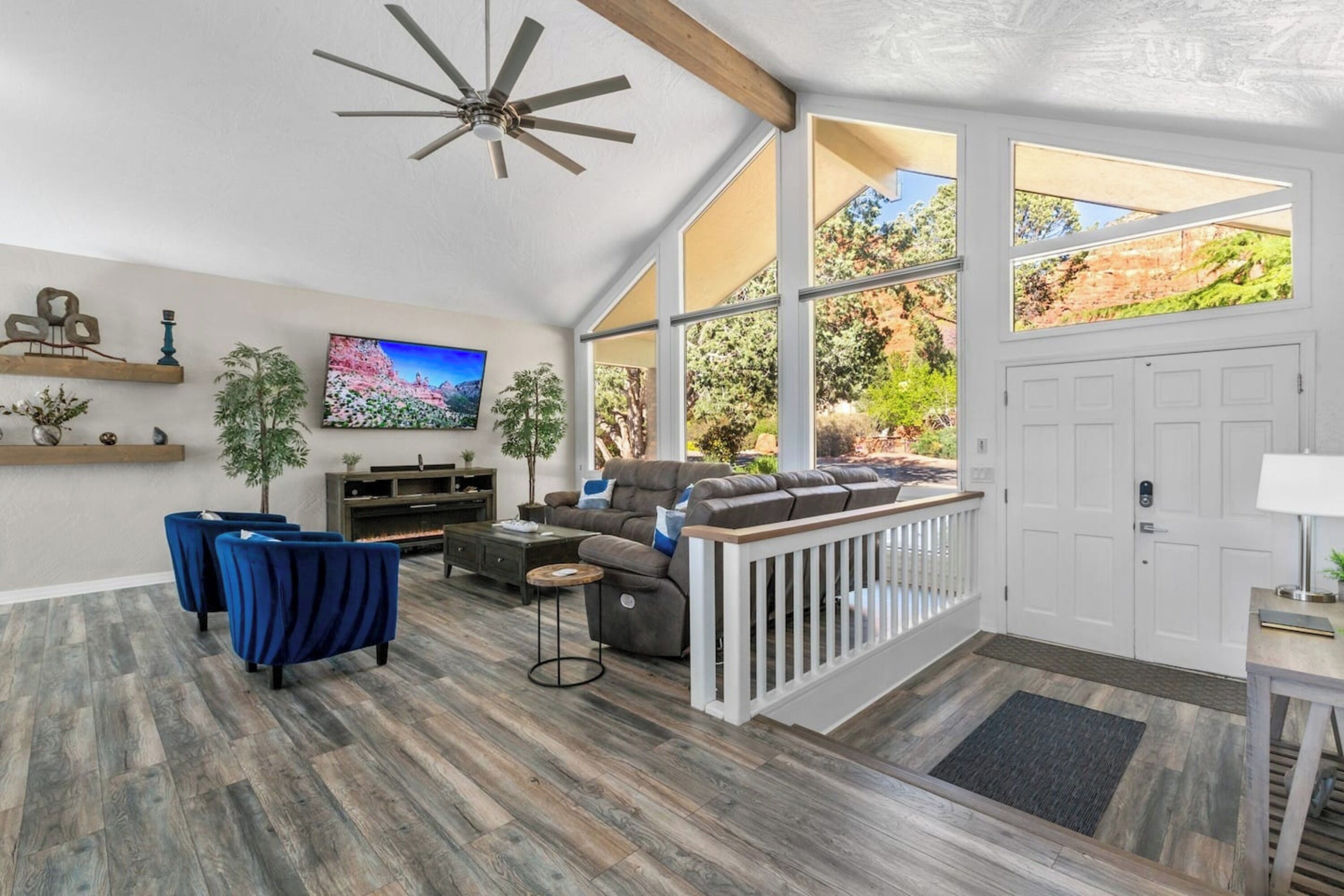 Signature House | Living room | 70-inch Smart TV with digital channels, fireplace, Netflix