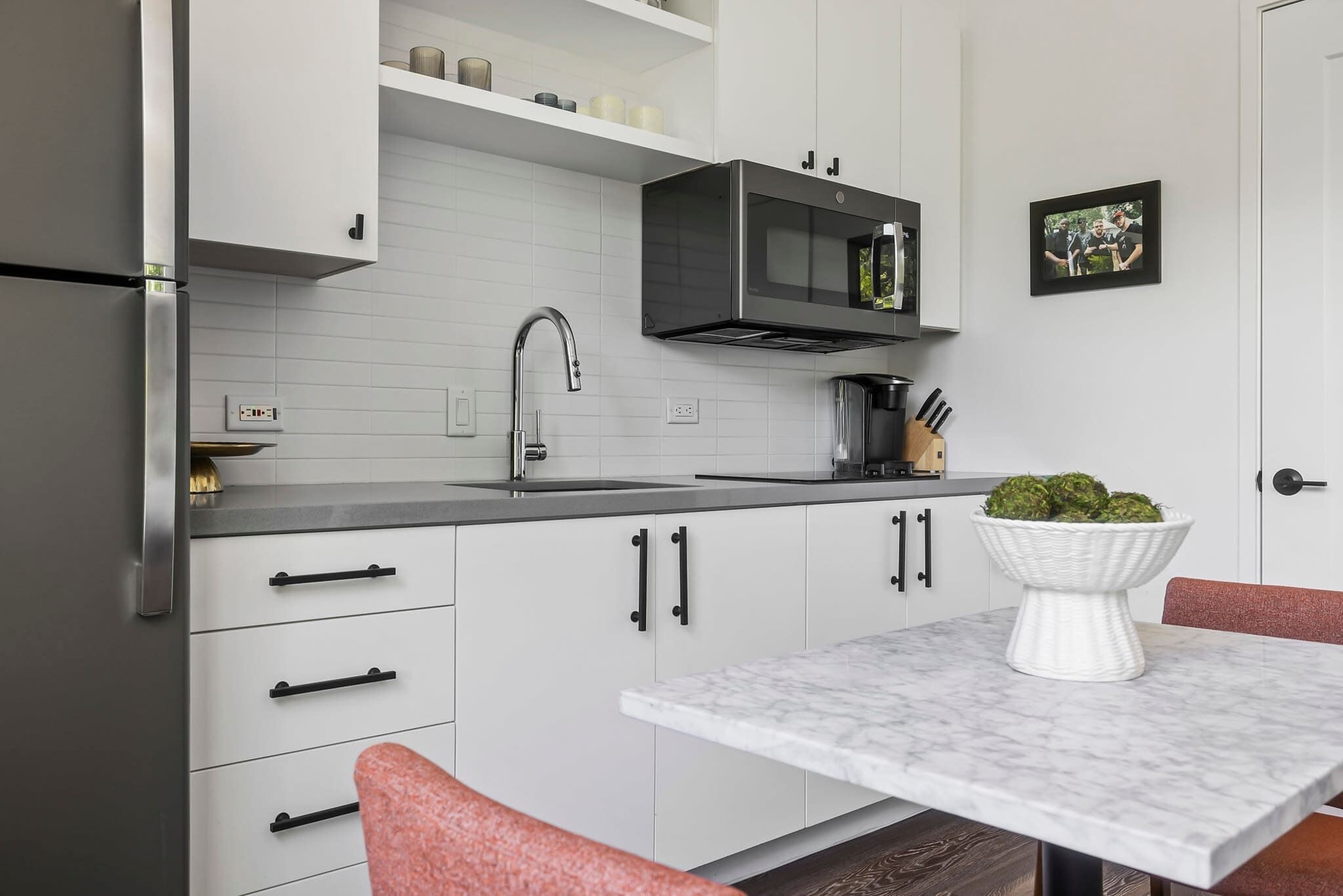 Fridge, microwave, coffee/tea maker, toaster