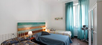 Apartment 'Stanza Per 3 Persone' with Balcony and Wi-Fi