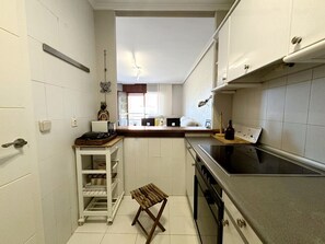 Microwave, coffee/tea maker, cookware/dishes/utensils