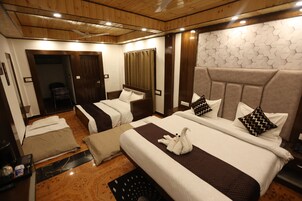 Suíte estúdio superior | Roupas de cama premium, edredons de pluma, individualmente mobiliados