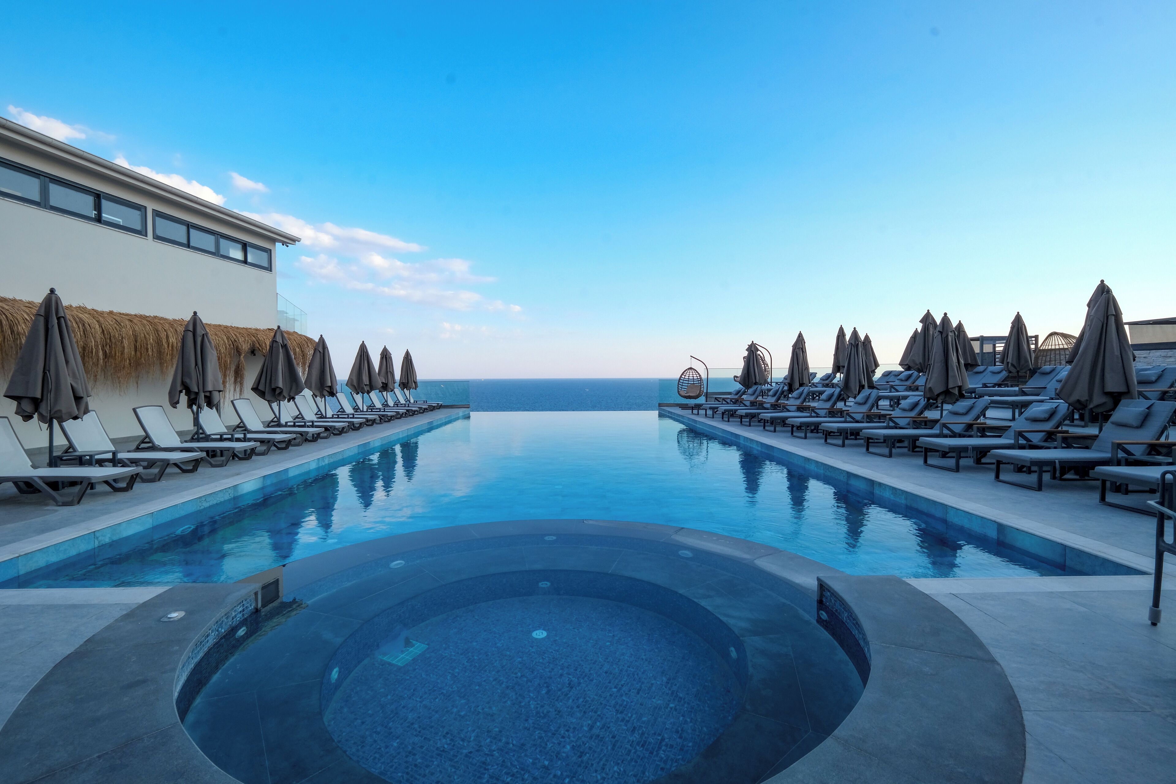 Outdoor pool, open 8:00 AM to 6:00 PM, cabanas (surcharge)