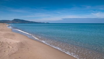 On the beach, white sand