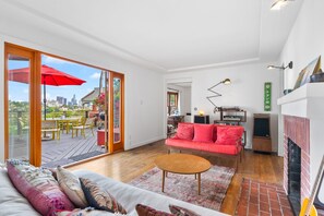 Smart TV, fireplace, books, music library