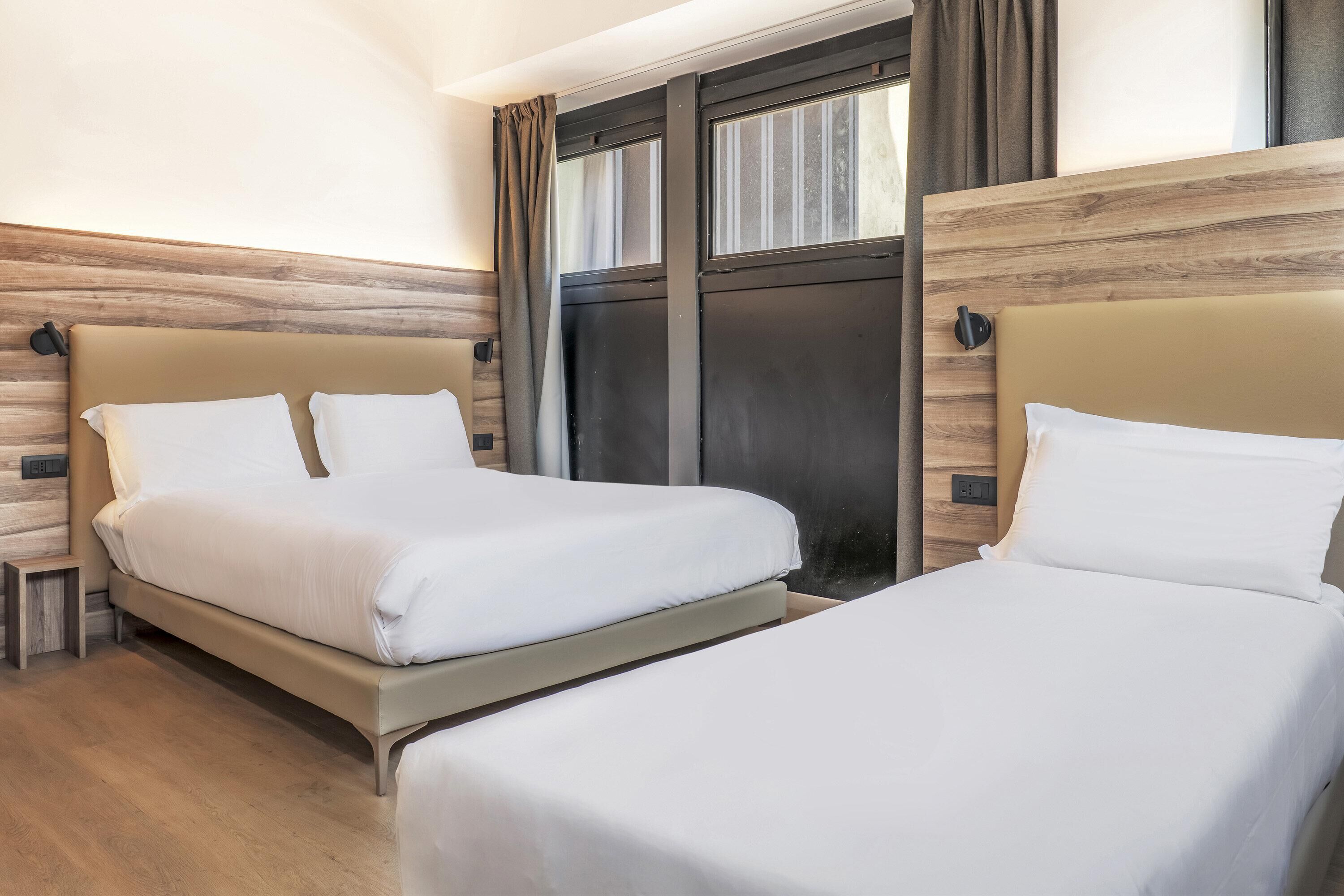 غرفة عادية ثلاثية - لغير المدخنين | خزنة داخل الغرفة وواي فاي مجانًا وملاءات أسرّة