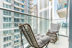 Luxury Apartment | Balcony view - Stayis-Emaar Beach front View 1 BR suite (Dubai)