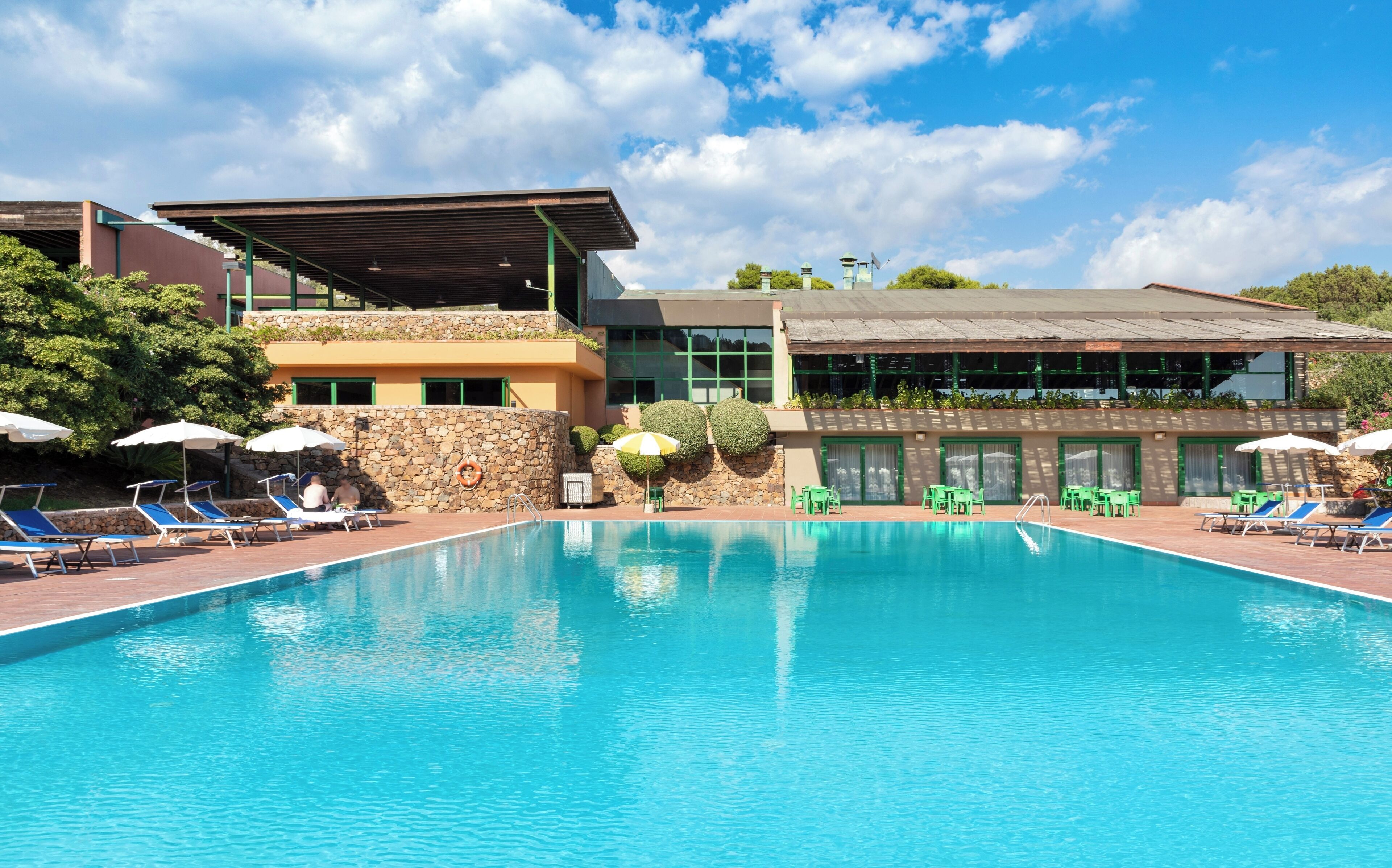 Seasonal outdoor pool, pool umbrellas, pool loungers