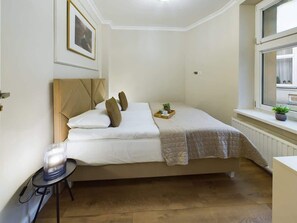 2 chambres, fer et planche à repasser, Wi-Fi, draps fournis