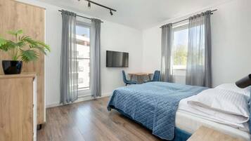 2 habitaciones, tabla de planchar con plancha, wifi y ropa de cama