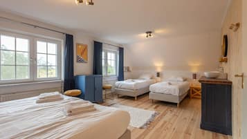 4 slaapkamers, een strijkplank/strijkijzer, wifi, beddengoed