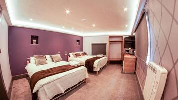 Chambre Quadruple Exécutive | Literie hypoallergénique, Wi-Fi gratuit