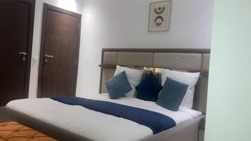 2 habitaciones, tabla de planchar con plancha, wifi y ropa de cama