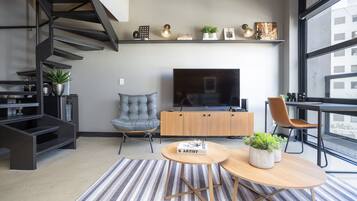 Apartamento | Área de estar | TV