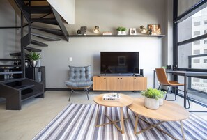 Apartamento | Área de estar | TV