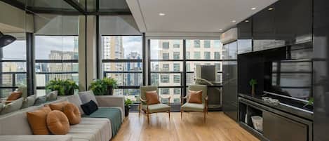 Exclusive Apartment | Living area | TV