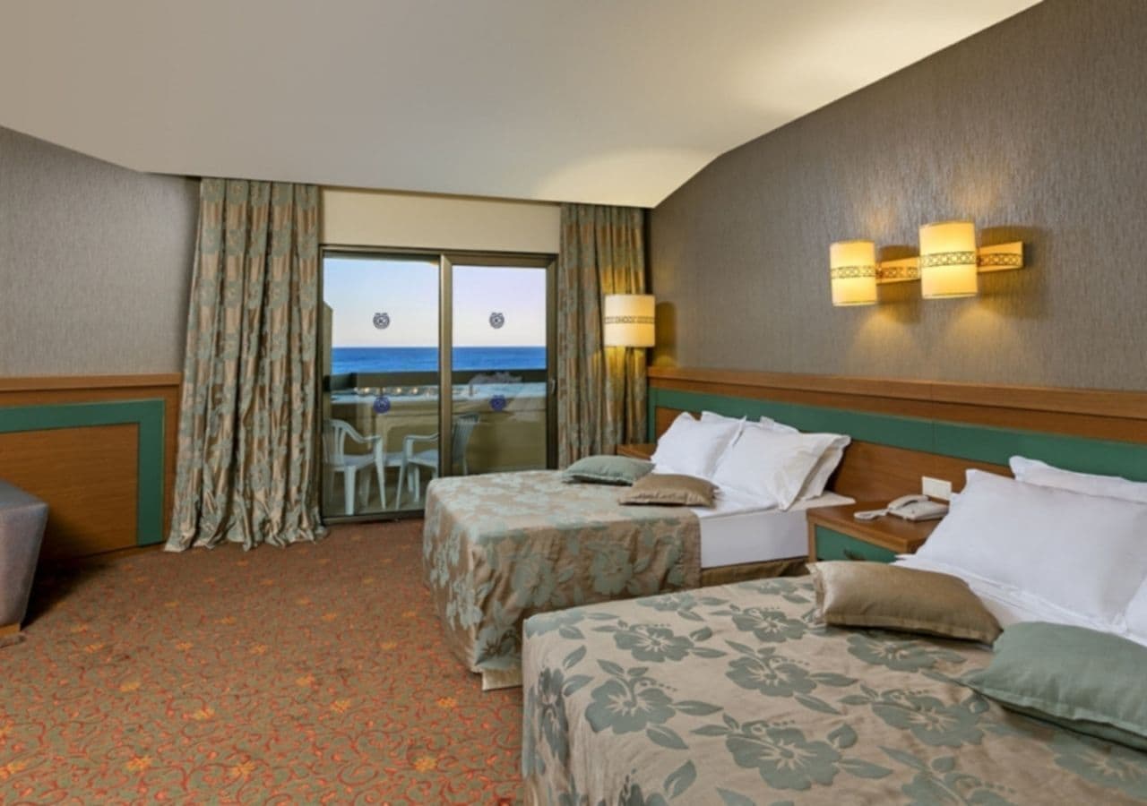 Family Room, 2 Bedrooms | Premium bedding, minibar, in-room safe, laptop workspace