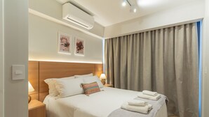 Apartemen Desain | 1 kamar tidur, seprai antialergi, dan ruang kerja ramah laptop