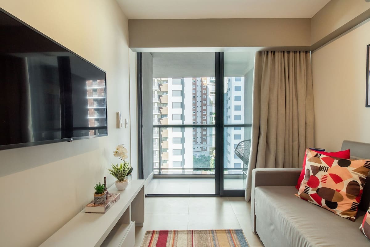 Apartment | Living area | 42-inch Smart TV with cable channels, Netflix, streaming services