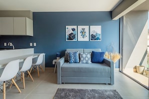 Basic Apartment | Living area | 42-inch Smart TV with cable channels, Netflix, streaming services