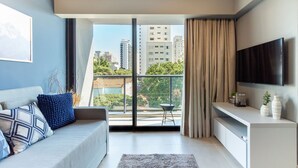 Apartemen Basic | Area keluarga | Smart TV 42-inci dengan saluran TV kabel, Netflix, dan layanan streaming