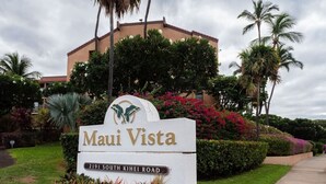 A sign for 'Maui Vista' with a logo, located at 2191 South Kihei Road. - Perfect location in Kihei! 5 minutes to the beach! (Kihei)