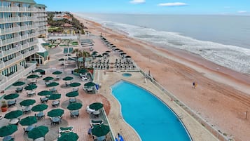 Indoor pool, outdoor pool, pool umbrellas, sun loungers