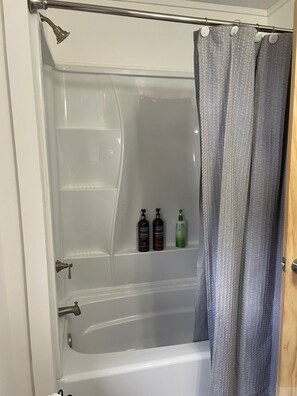 Hair dryer, towels, soap, shampoo