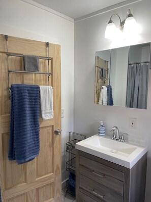 Hair dryer, towels, soap, shampoo