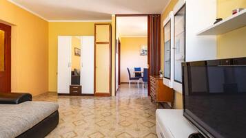 Apartment (Two Bedroom Apartment with Terrace) | Living room | 32-inch flat-screen TV with digital channels
