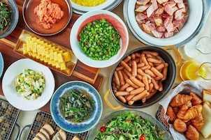 A variety of food dishes arranged on a table.