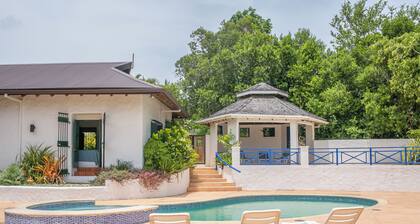 Large deck with views of the Caribbean Sea! Super king beds in luxurious villa.