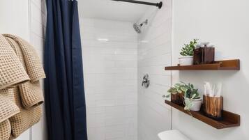 Hair dryer, towels, soap, shampoo