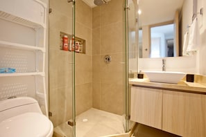 Shower, hair dryer, towels, soap