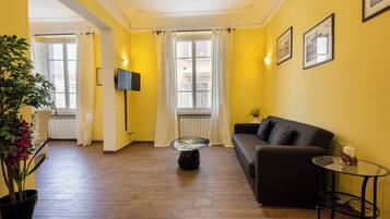 Comfort-Apartment | Wohnbereich | 40-Zoll-Flachbildfernseher mit Digitalempfang