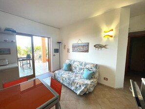 House, 3 Bedrooms, Smoking, Balcony | Living area - Casa I Corbezzoli - Paduledda - Isola Rossa (Trinità d'Agultu e Vignola)