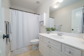 Hair dryer, towels, soap, shampoo