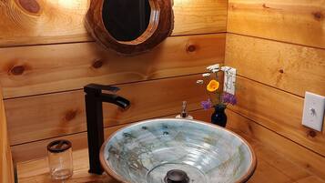 Shower, towels, soap, toilet paper