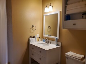 Hair dryer, towels, soap, toilet paper