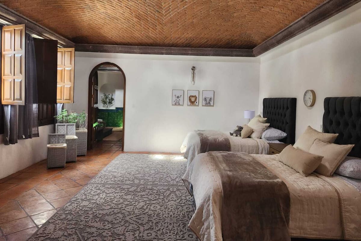 Deluxe Quadruple Room | 1 bedroom, premium bedding, in-room safe, individually decorated