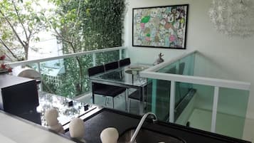 Apartment 02 | Private kitchen | Mini-fridge, microwave, stovetop, dishwasher