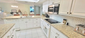 Condo, Multiple Beds, Balcony (Saida Towers IV #303) | Private kitchen | Fridge, microwave, oven, stovetop