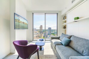 Deluxe Condo, 1 Bedroom, City View | Living area | 50-inch plasma TV with cable channels - Amazing Apartments with city Views (Miami)