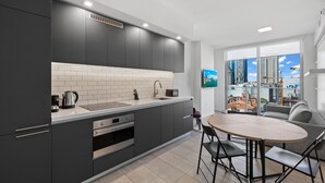 Deluxe Condo, 1 Bedroom, City View | Private kitchen | Coffee/tea maker, fridge, oven, stovetop