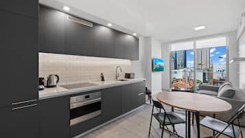 Deluxe Condo, 1 Bedroom, City View | Private kitchen | Fridge, oven, stovetop, dishwasher