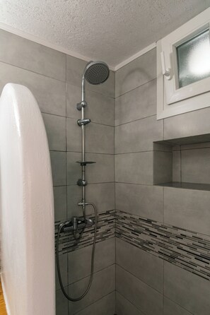 Shower, hair dryer, towels, soap