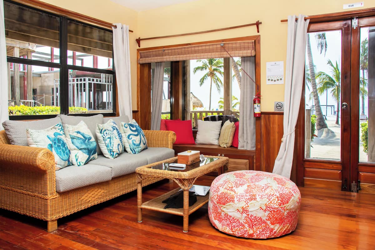 Signature Single Room, 1 King Bed, Sea View, Ground Floor | Living area | 32-inch Smart TV with cable channels, Netflix, streaming services